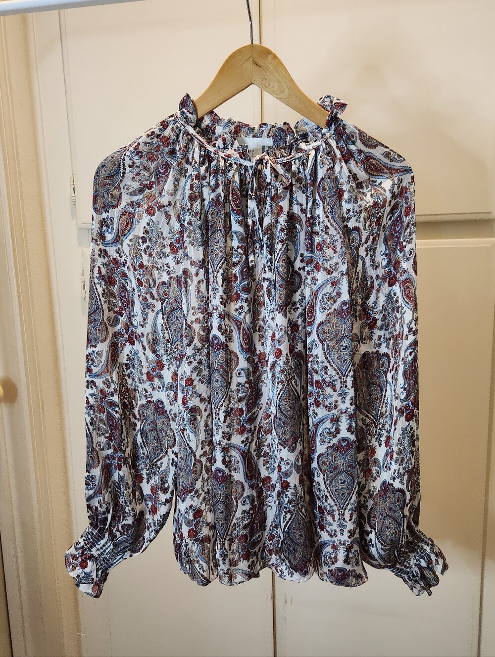 H&M paisley print blouse with ruffles and bow neck tie